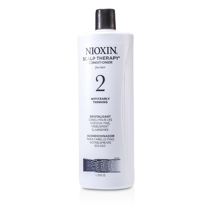 Nioxin نظام 2بلسم معالج لفروة الرأس للشعر الرقيق والخفيف بشكل ملحوظ 1000ml/33.8ozProduct Thumbnail