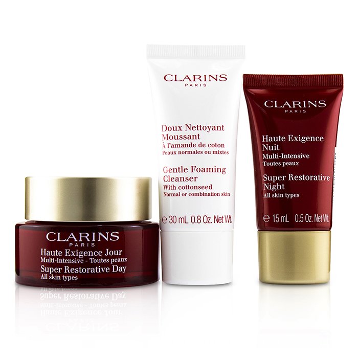 Clarins Super Restorative Essential Care Set: Day Cream 50 ml + Night Cream 15 ml + Gentle Foaming Cleanser 30 ml 3pcsProduct Thumbnail